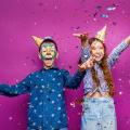Portrait positive cheerful little girl boy have fun isolated violet color wall serpentine flying 496169 2628